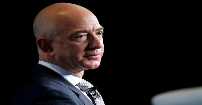 FILE PHOTO: Jeff Bezos, founder of Blue Origin and CEO of Amazon, speaks about the future plans