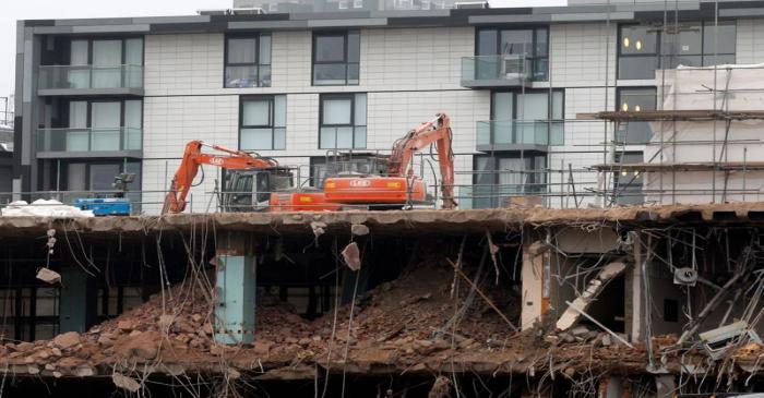 FILE PHOTO:  Construction diggers are seen at a site being demolished to make room for new