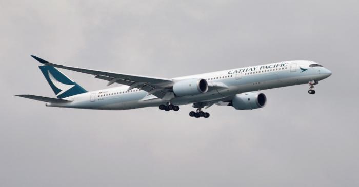 A Cathay Pacific Airways Airbus A350 airplane approaches to land at Changi International