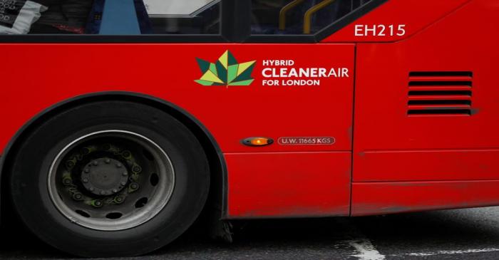 A hybrid sign on the side of a bus is pictured in London