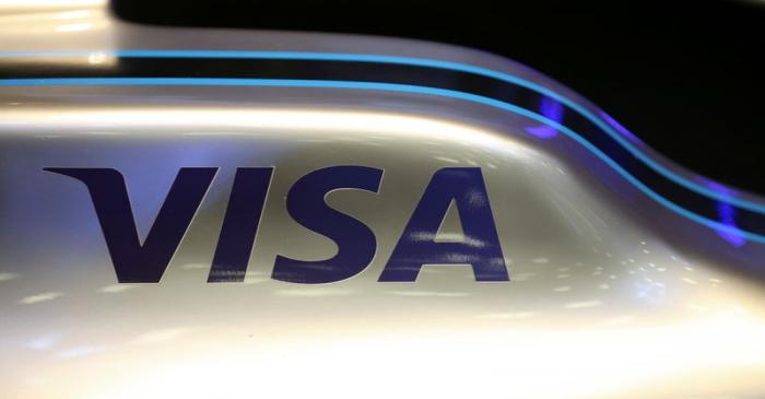 A Visa logo is seen on a Formula E racing car during a news conference to present the