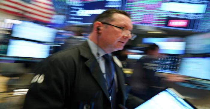 FILE PHOTO:  A trader works at the New York Stock Exchange