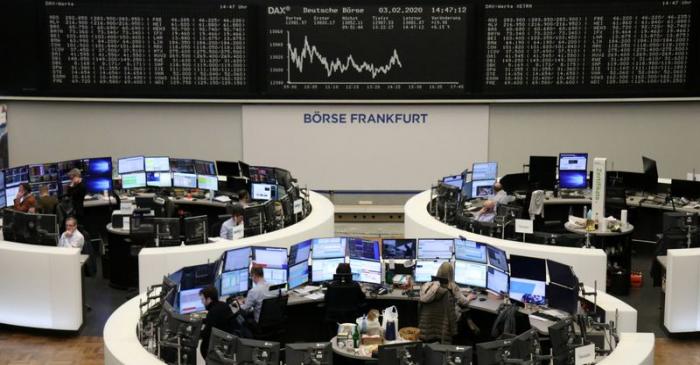 FILE PHOTO:  The German share price index DAX graph is pictured at the stock exchange in