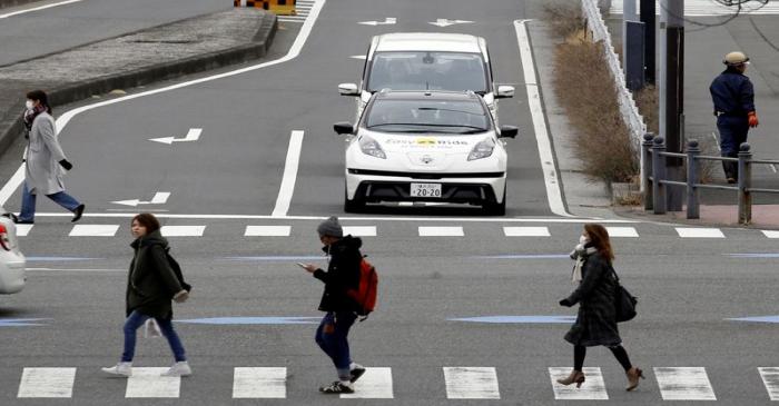 FILE PHOTO: A self-driving vehicle, based on Nissan Leaf EV, for Easy Ride service, developed