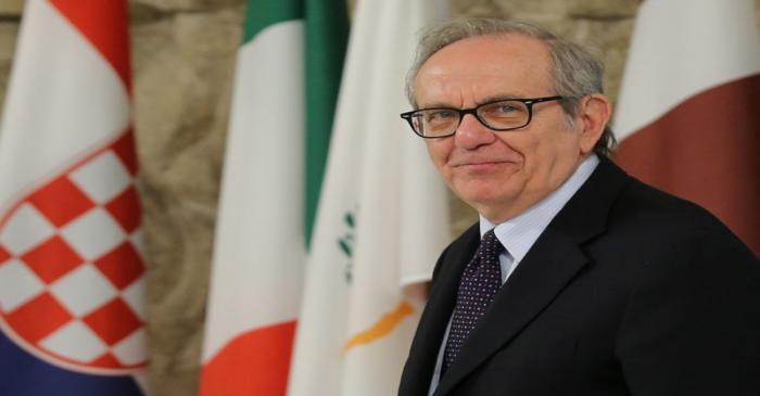 Italian Economy Minister Carlo Padoan arrives for the Informal meeting of economic and