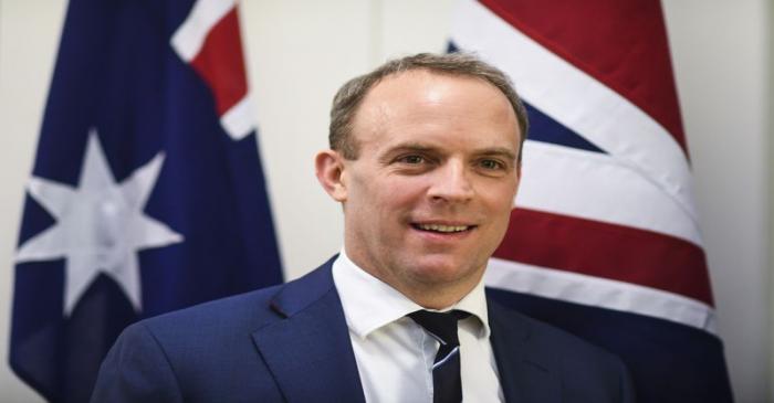 Britain's Foreign Secretary Dominic Raab poses for photographs ahead of a bilateral meeting at
