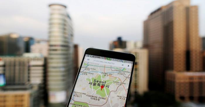 FILE PHOTO: A photo illustration shows Google Maps application displayed on a smartphone in