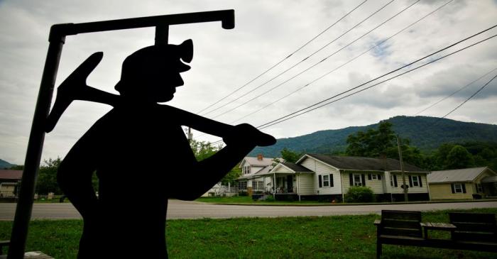 A small memorial remembering local coal miners who died on the job or of mining related