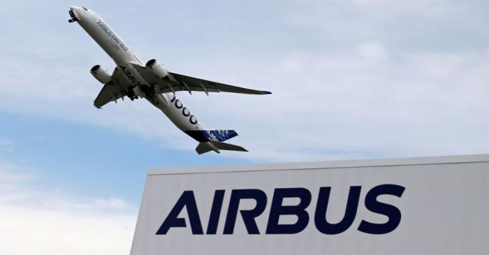 An Airbus A350-1000 performs during the 53rd International Paris Air Show at Le Bourget Airport