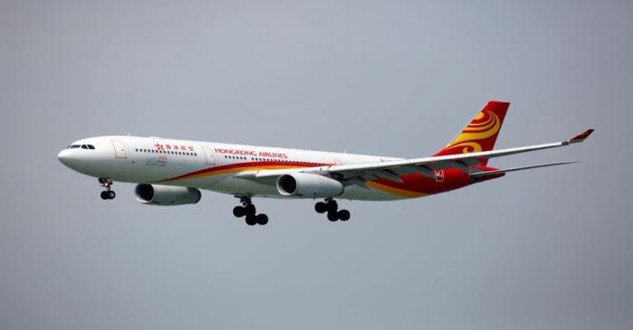 FILE PHOTO:  A Hong Kong Airlines Airbus A330-343 descends before landing at Hong Kong Airport