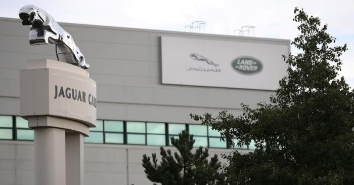 FILE PHOTO: Signs are seen outside the Jaguar Land Rover plant at Halewood in Liverpool,