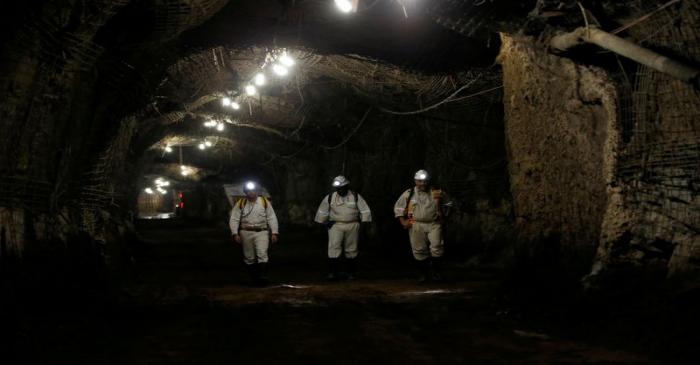 FILE PHOTO: Workers are seen underground South Africa's Gold Fields South Deep mine in