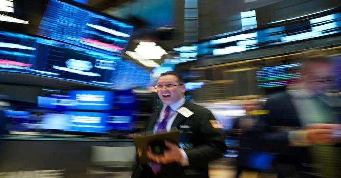 A trader works at the New York Stock Exchange