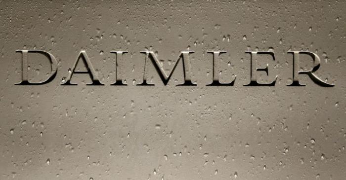 FILE PHOTO: Daimler AG sign with raindrops is pictured before the company's 2016 annual news