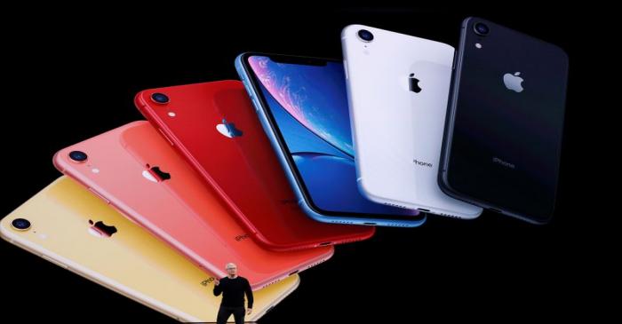 FILE PHOTO: CEO Tim Cook presents the new iPhone 11 at an Apple event at their headquarters in