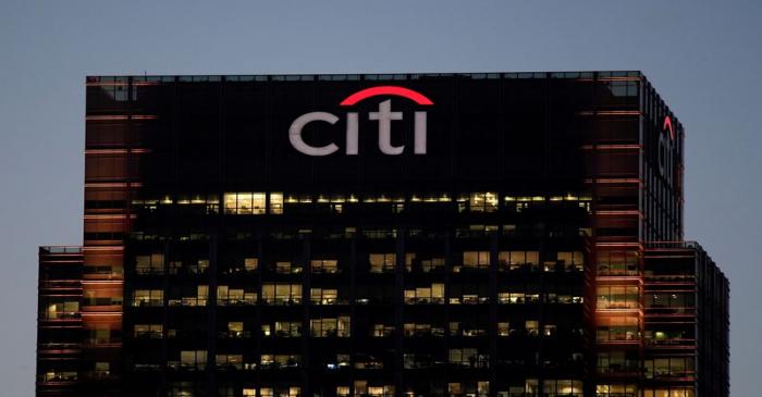 FILE PHOTO: Workers are seen in Citibank offices in the Canary Wharf financial district in