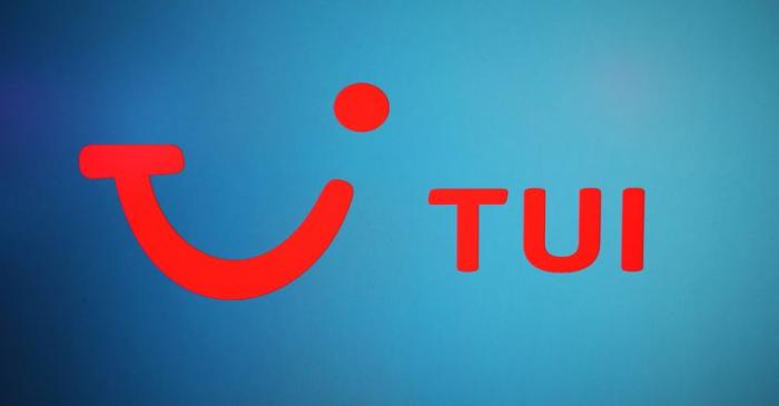 The TUI logo is displayed on a computer screen in London