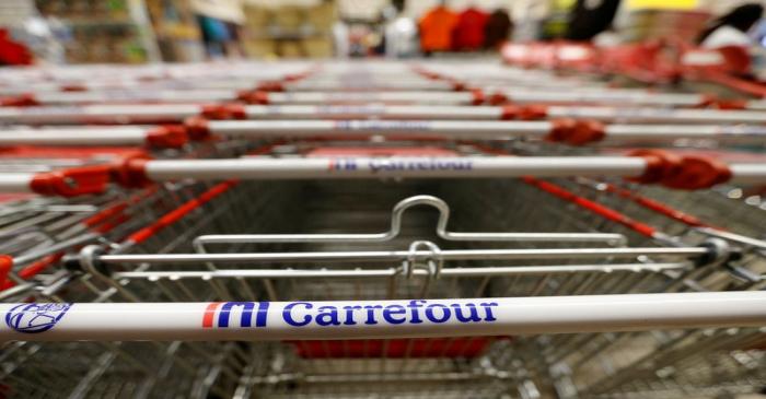FILE PHOTO: Shopping trolleys are arranged inside the Carrefour hypermarket at the Two Rivers