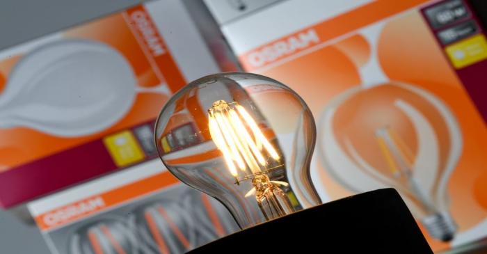 FILE PHOTO: Picture illustration of a lightbulb and lightbulb packaging of German manufacturer