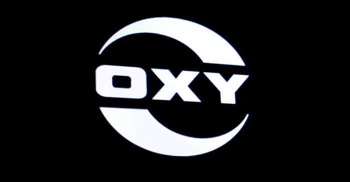 FILE PHOTO: The logo for Occidental Petroleum is displayed on a screen on the floor at the NYSE