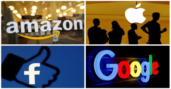 FILE PHOTO: The logos of Amazon Apple Facebook and Google