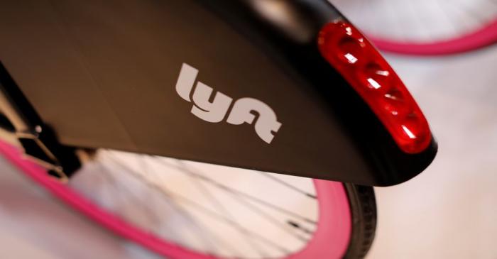 FILE PHOTO: A Lyft bicycle is shown at the Lyft listing on the Nasdaq during an IPO event in