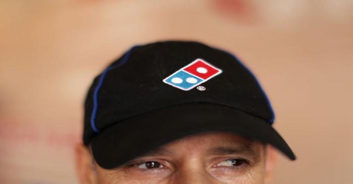 A Domino's Pizza employee works in a restaurant in Los Angeles