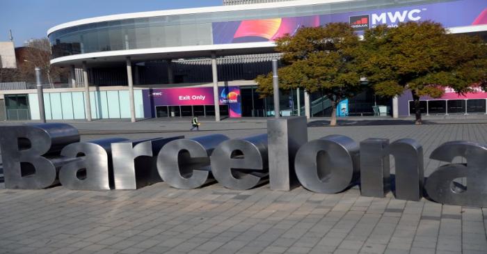 FILE PHOTO: Employee walks at Fira de Barcelona after the Mobile World Congress (MWC) was