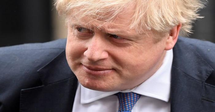 Britain's Prime Minister Boris Johnson arrives at Downing Street in London