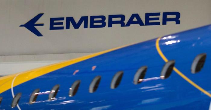 The logo of Brazilian planemaker Embraer SA is seen at the company's headquarters in Sao Jose