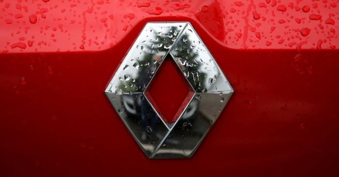 The logo of French car manufacturer Renault is seen on a car at a dealership of the company in