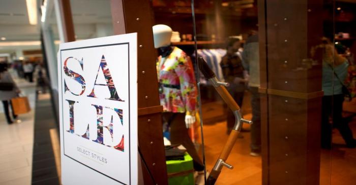 A sale sign is positioned outside the Robert Graham store of the King of Prussia Mall, United