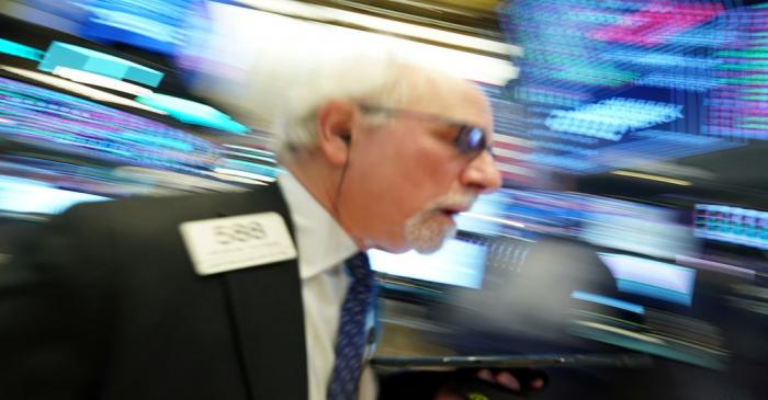 A trader works at the New York Stock Exchange