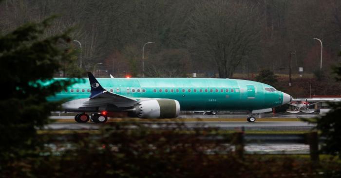 A Boeing 737 Max aircraft taxis the runway at the Renton Municipal Airport in Renton