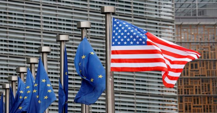 U.S. and EU flags are pictured during the visit of Vice President Pence to the European