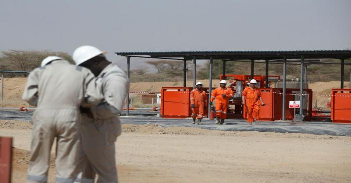 FILE PHOTO: Workers are seen at Tullow Oil's Ngamia 8 drilling site in Lokichar
