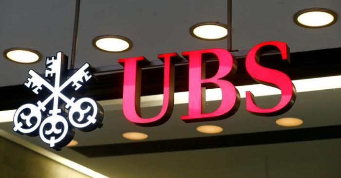 FILE PHOTO: Logo of Swiss bank UBS is seen at a branch office in Zurich