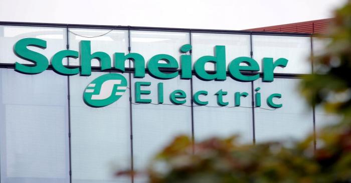 FILE PHOTO: The logo of Schneider Electric is seen at the company's headquarters in