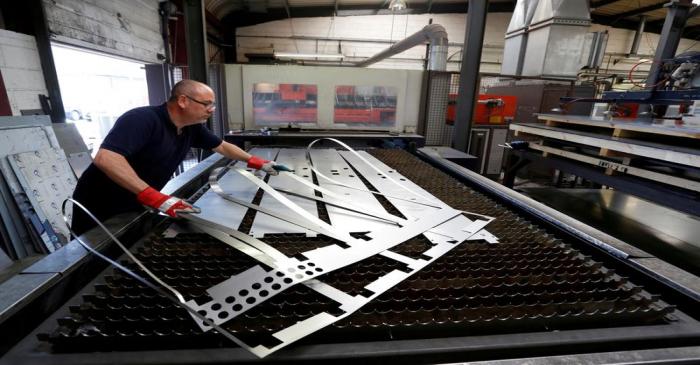 FILE PHOTO: Laser operator Shaun Clements removes an offcut at Contracts Engineering Ltd, a