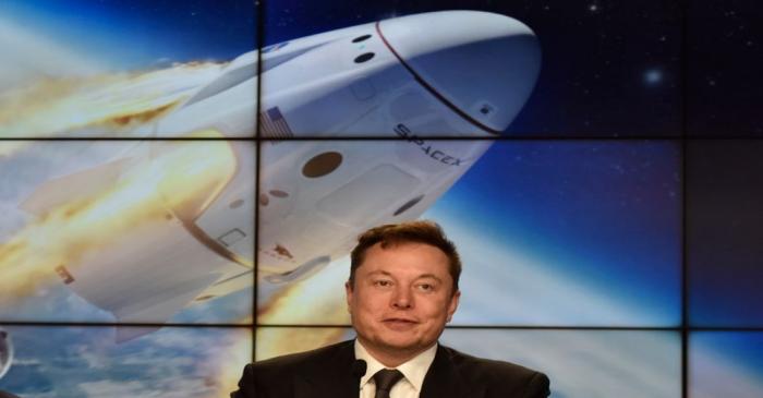 SpaceX founder and chief engineer Elon Musk attends a post-launch news conference to discuss