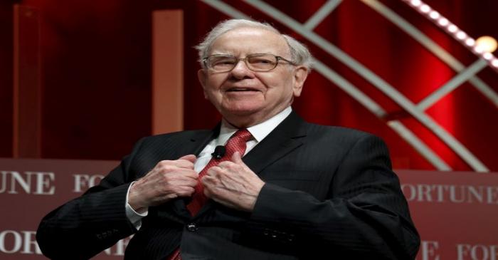Buffett, chairman and CEO of Berkshire Hathaway, takes his seat to speak at the Fortune's Most