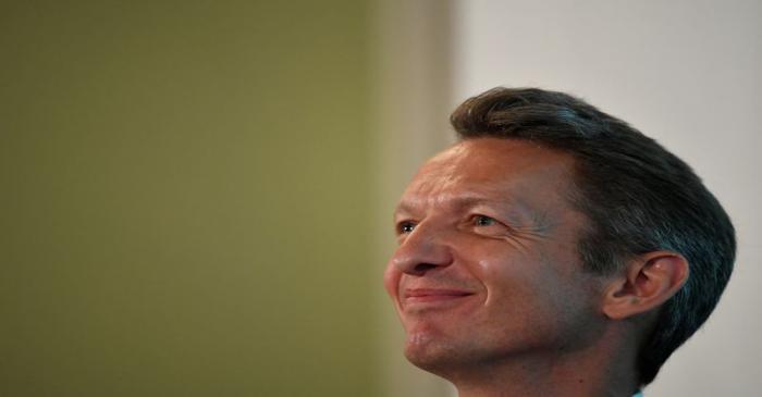 The Chief Economist of the Bank of England, Andy Haldane, listens from the audience at an event