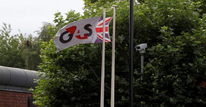 Flags fly outside HMP Birmingham after the British government took over its running from G4S,