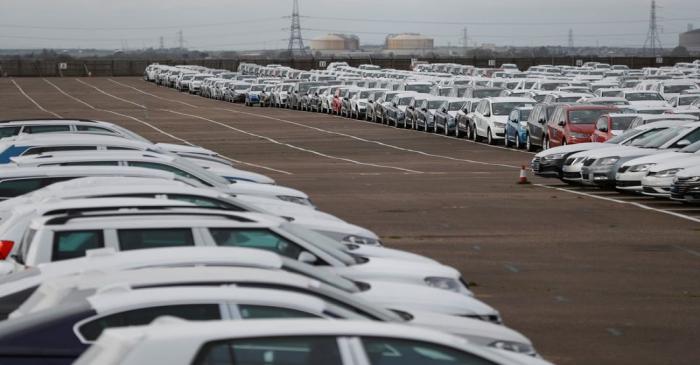 Imported cars are parked in a storage area at Sheerness port, Sheerness