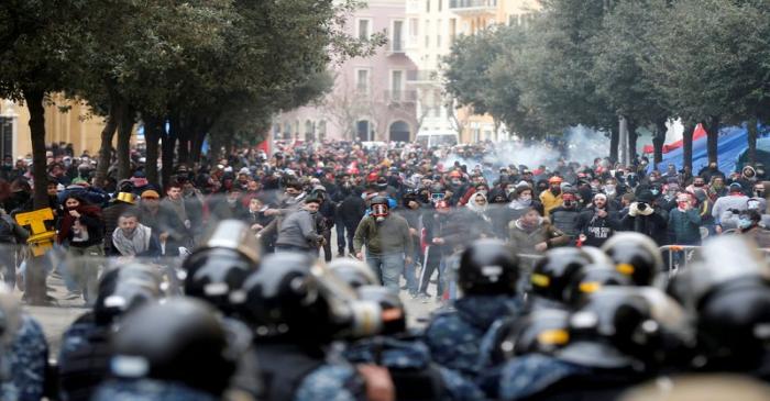 FILE PHOTO: Demonstrators take part in a protest seeking to prevent MPs and government