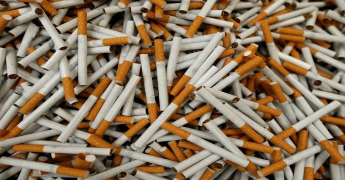 FILE PHOTO: Cigarettes are seen during manufacturing process in BAT Cigarette Factory in