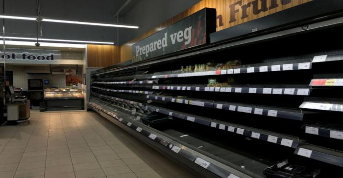 Empty shelves are seen at a Sainsbury's store in south London as the numbers of coronavirus