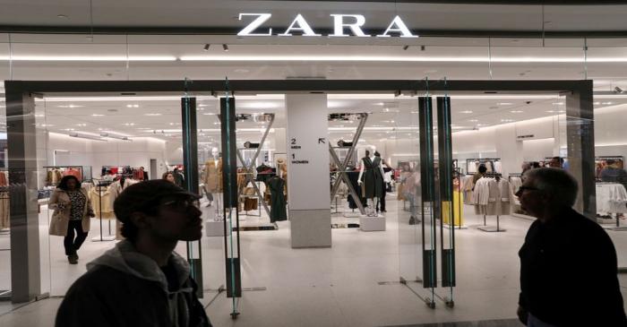 FILE PHOTO: People shop at a Zara store during the grand opening of The Hudson Yards