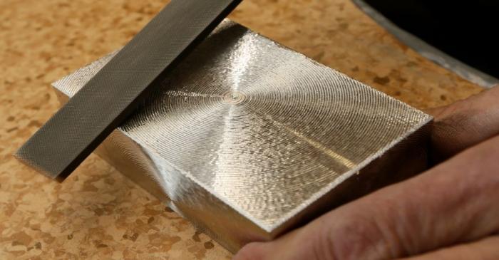 FILE PHOTO: An employee works at the Krastsvetmet non-ferrous metals plant in Krasnoyarsk