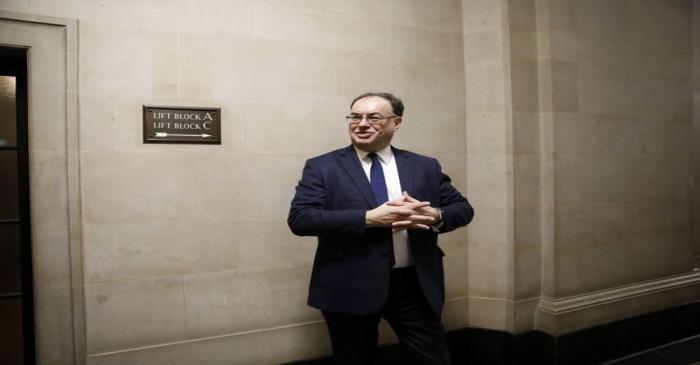 FILE PHOTO: Bank of England Governor Andrew Bailey poses for a photograph on the first day of